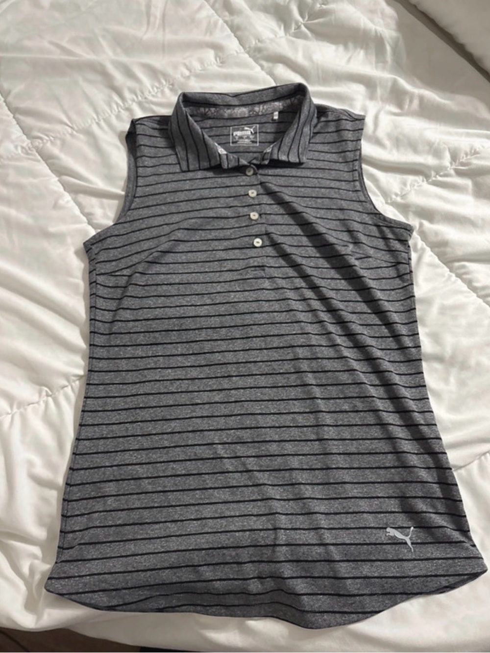 Sleeveless polo-style top